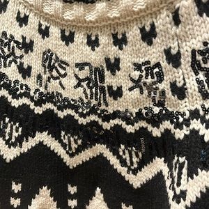 ZARA: limited edition sweater. Creamy white w/black and a sprinkle of sequins.